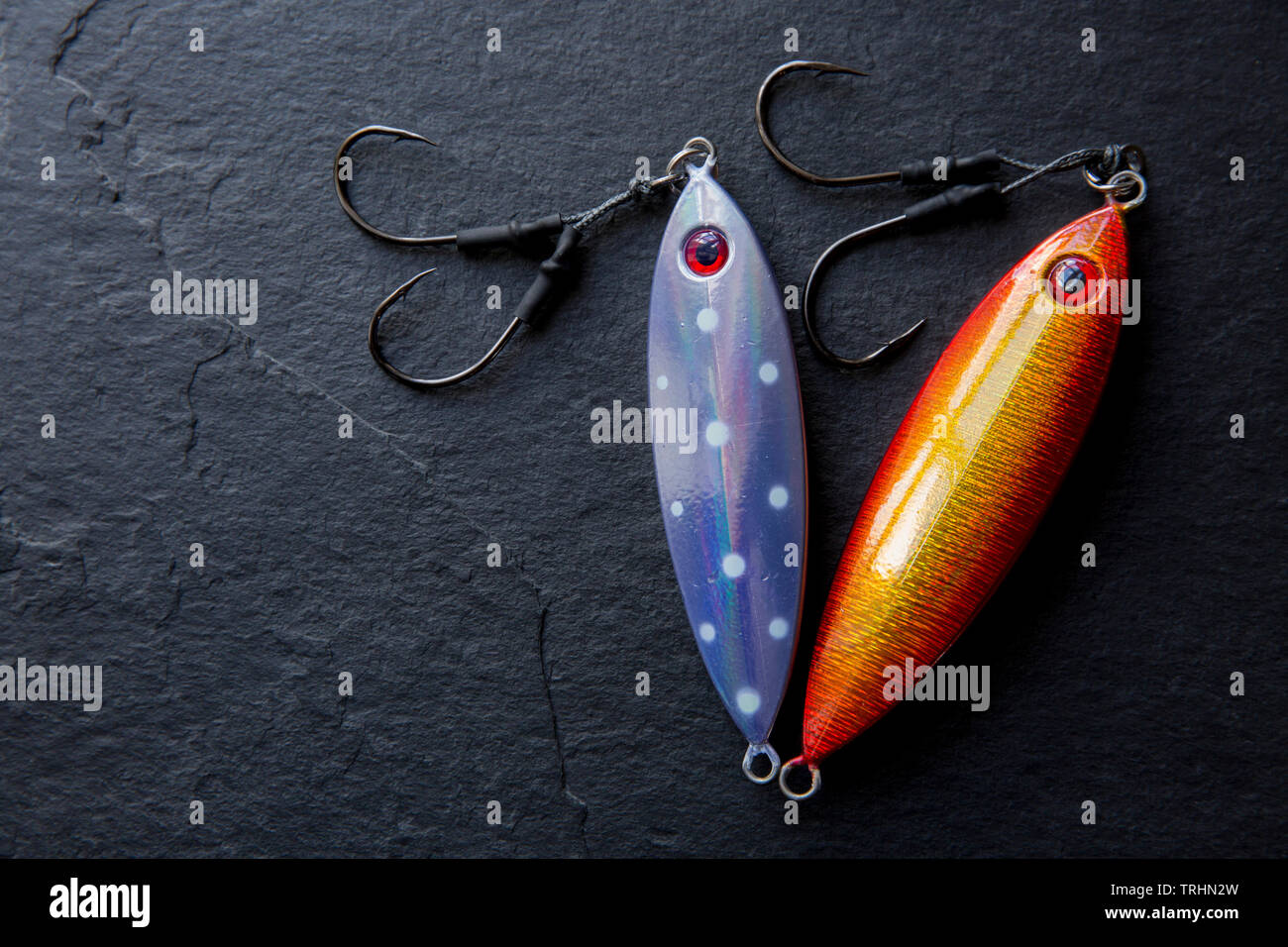 Shop display of colourful fishing lures and flies for anglers Stock Photo -  Alamy