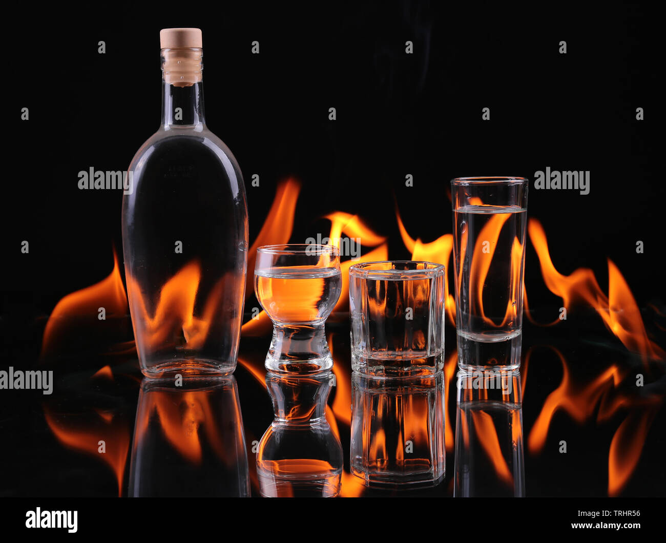 Stack of tequila on fire Stock Photo - Alamy