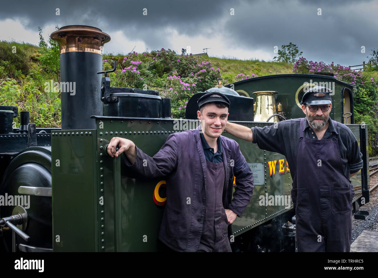 Firemen, Vale of Rheidol Steam Railway, at Devil's Bridge Station, near Abertsywyth, Ceredigion, Wales Stock Photo