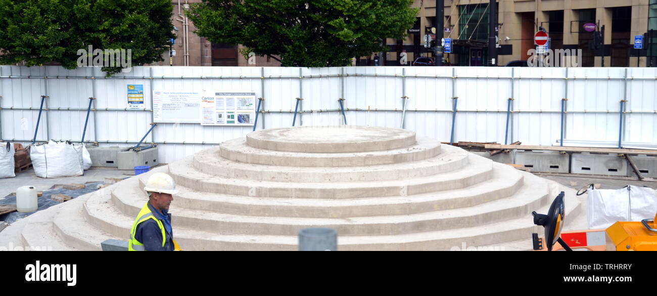 June 6, 2019. The site where a memorial to commemorate the Peterloo massacre of 1819 is being built in Manchester uk. The memorial will currently be a landscaped hill made out of concentric steps. On August 16, 1819, cavalry charged a crowd of some 60,000 people gathered on St Peter's Fields, Manchester, to demand the reform of parliamentary representation. Eighteen people were killed and hundreds injured. Stock Photo