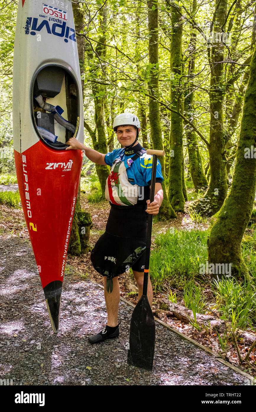 A young man practicin kayaking at the Tryweryn river, National White