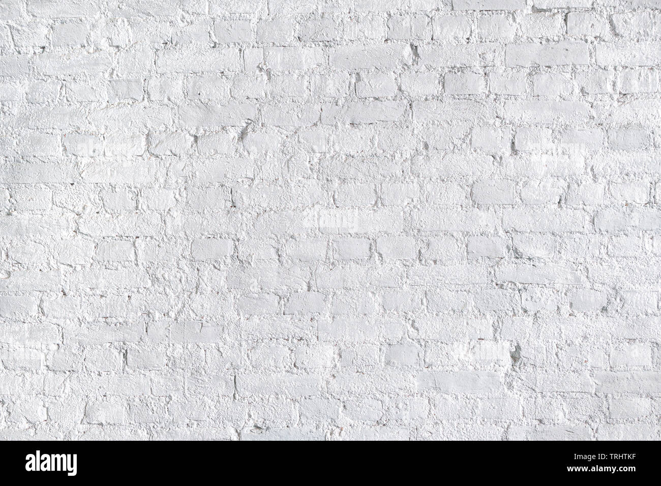 White rough brick wall close up. Texture and background Stock Photo