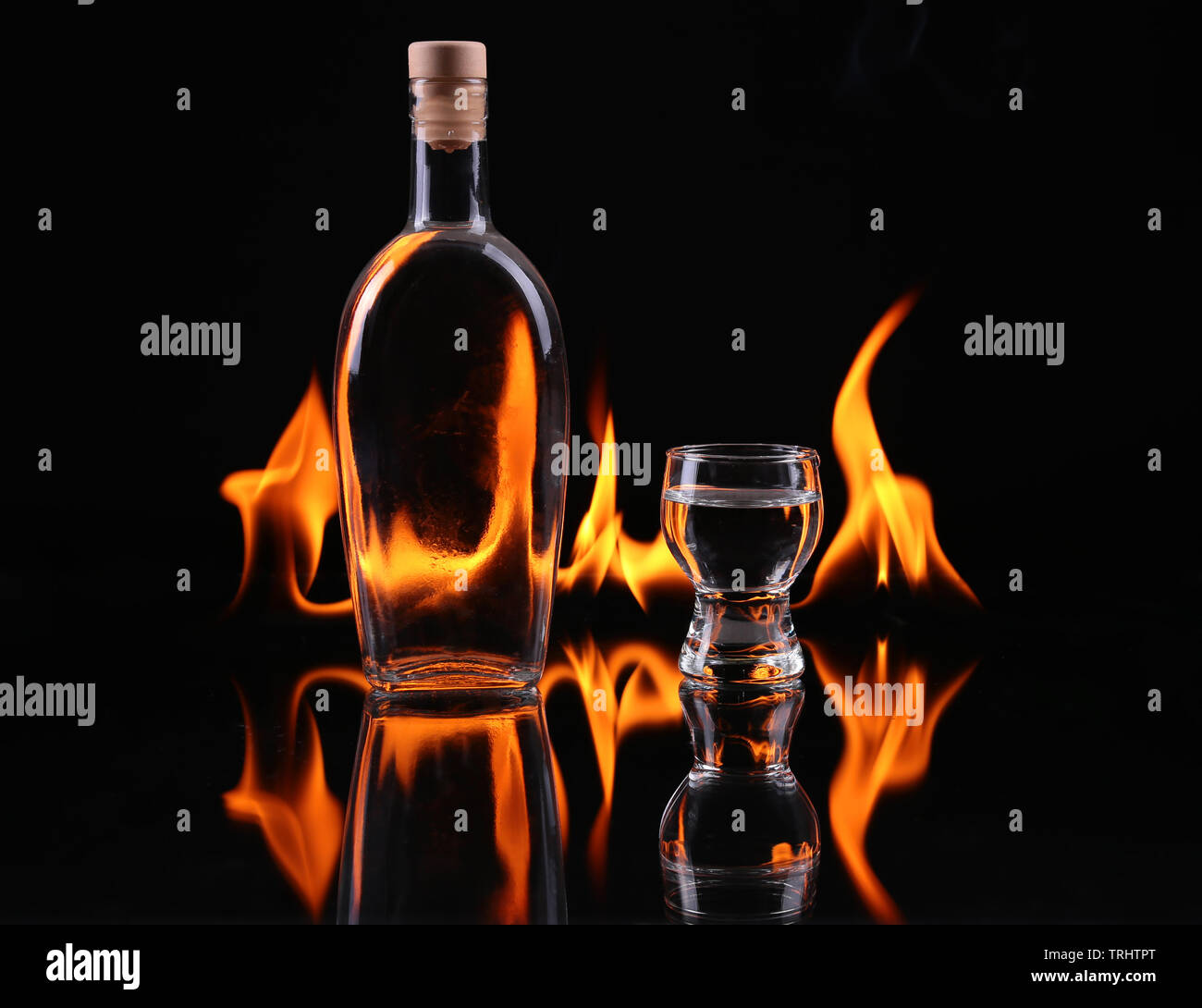 Stack of tequila on fire Stock Photo - Alamy