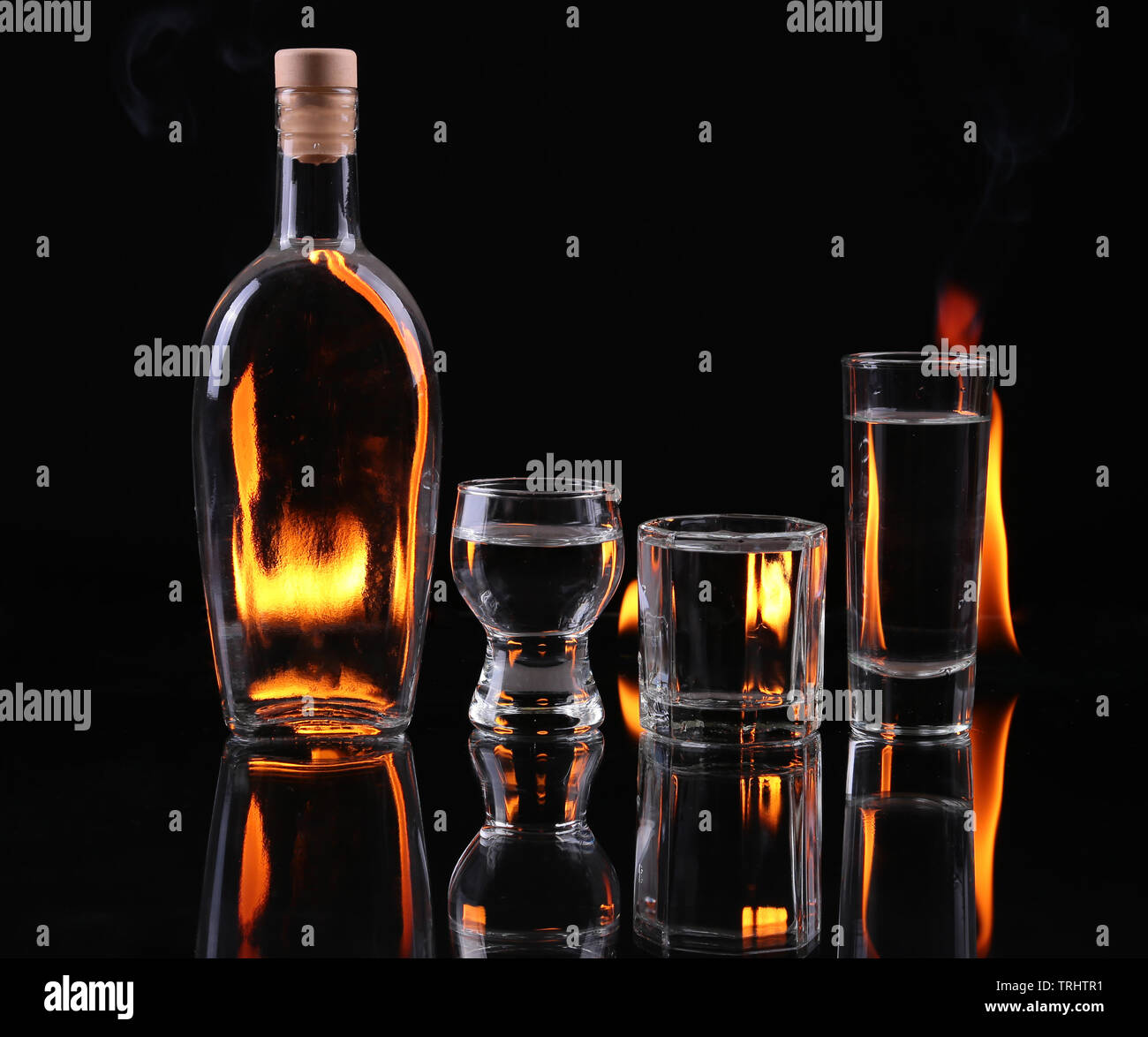 Stack of tequila on fire Stock Photo - Alamy