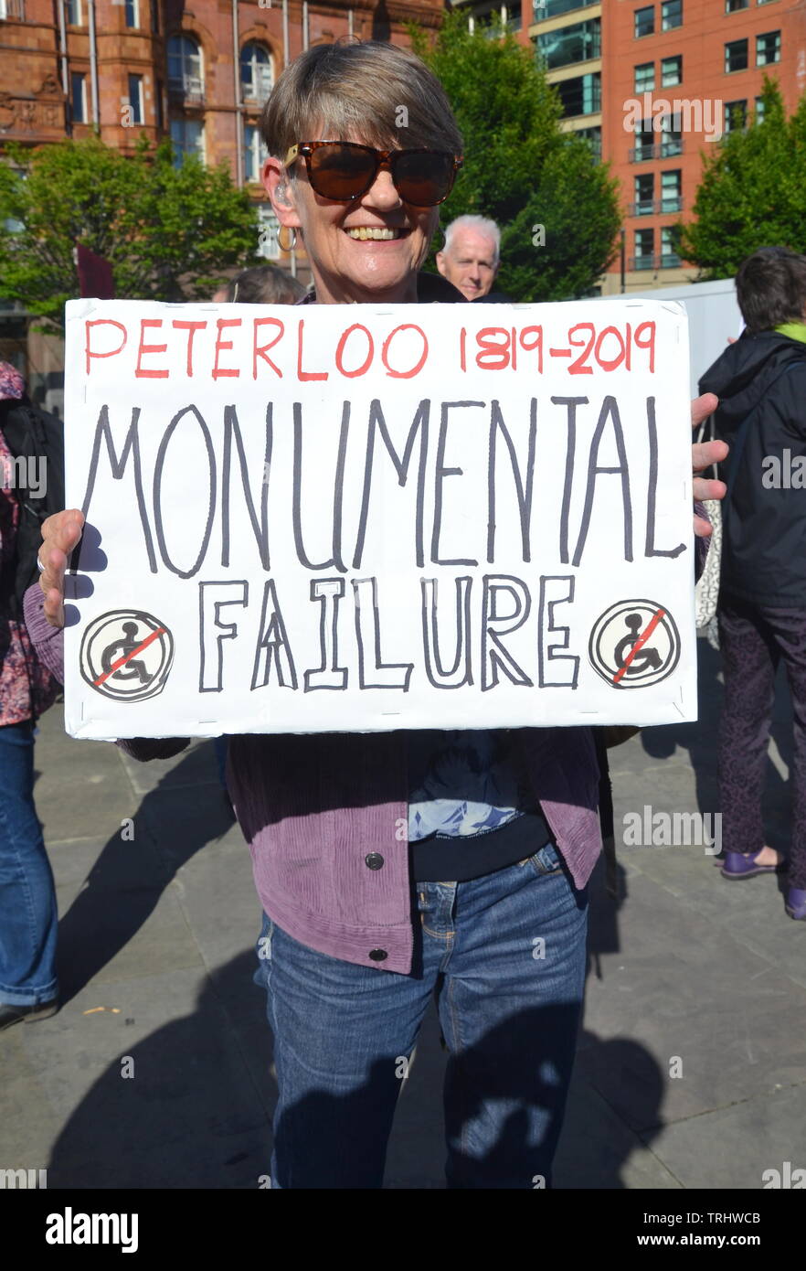 June 6, 2019. Actress and writer Ali Briggs who plays Freda Burgess in TV soap Coronation Street joins disabled people and supporters protesting at the site where a memorial to commemorate the Peterloo massacre of 1819 is being built in Manchester uk. The memorial, developed by Manchester City Council, will currently be a landscaped hill made out of concentric steps. The protesters argue that it is inaccessible for many disabled people and should be amended. Stock Photo