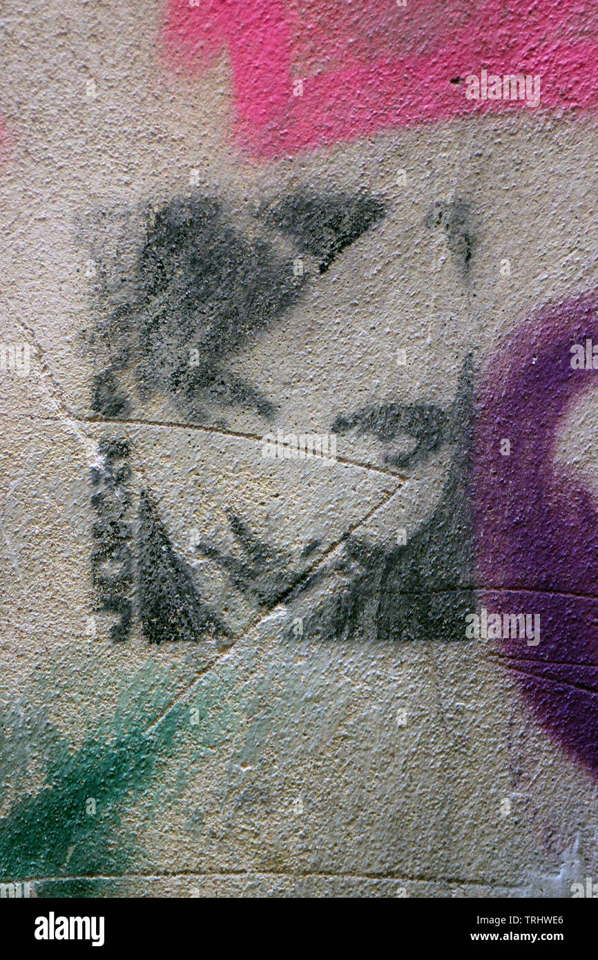 Stencil art on a wall in Old Town of Prague, Czech Republic Stock Photo