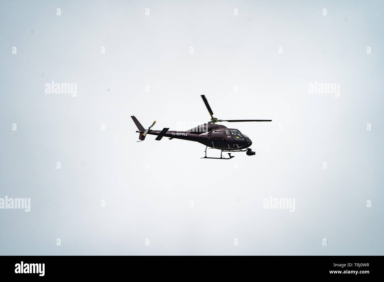 TV helicopter at the Isle of Man TT road races, 2019 Stock Photo