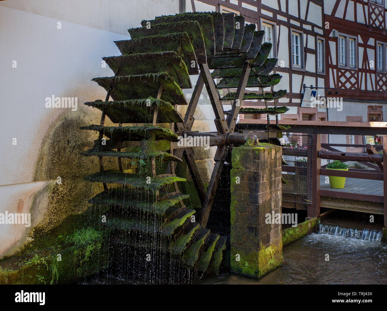 Historical water mill at the Queich stream, old town of Annweiler am Trifels, Rhineland-Palatinate, Germany Stock Photo