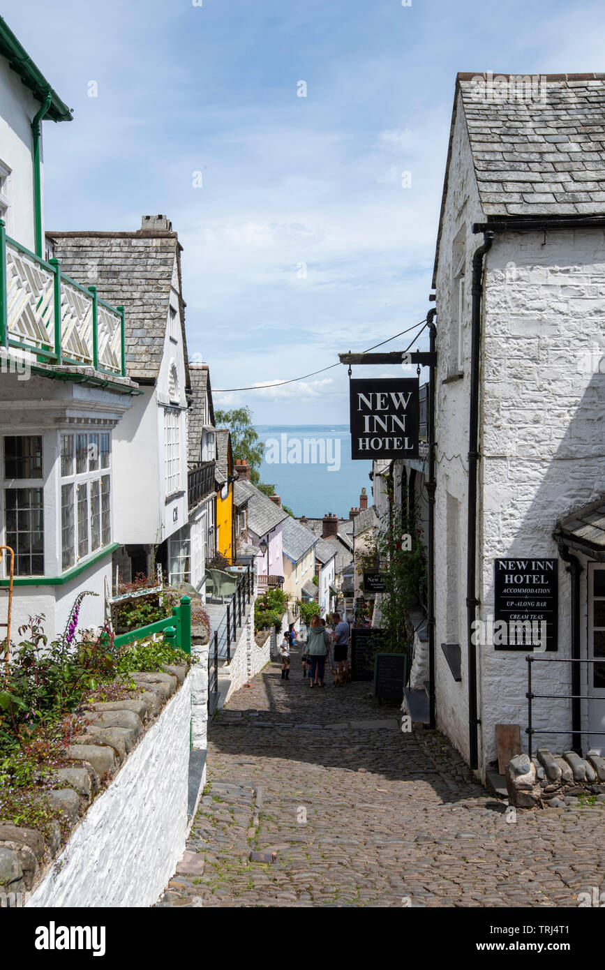 A sunny spring day on the cobbled streets of Clovelly, Devon England UK Stock Photo