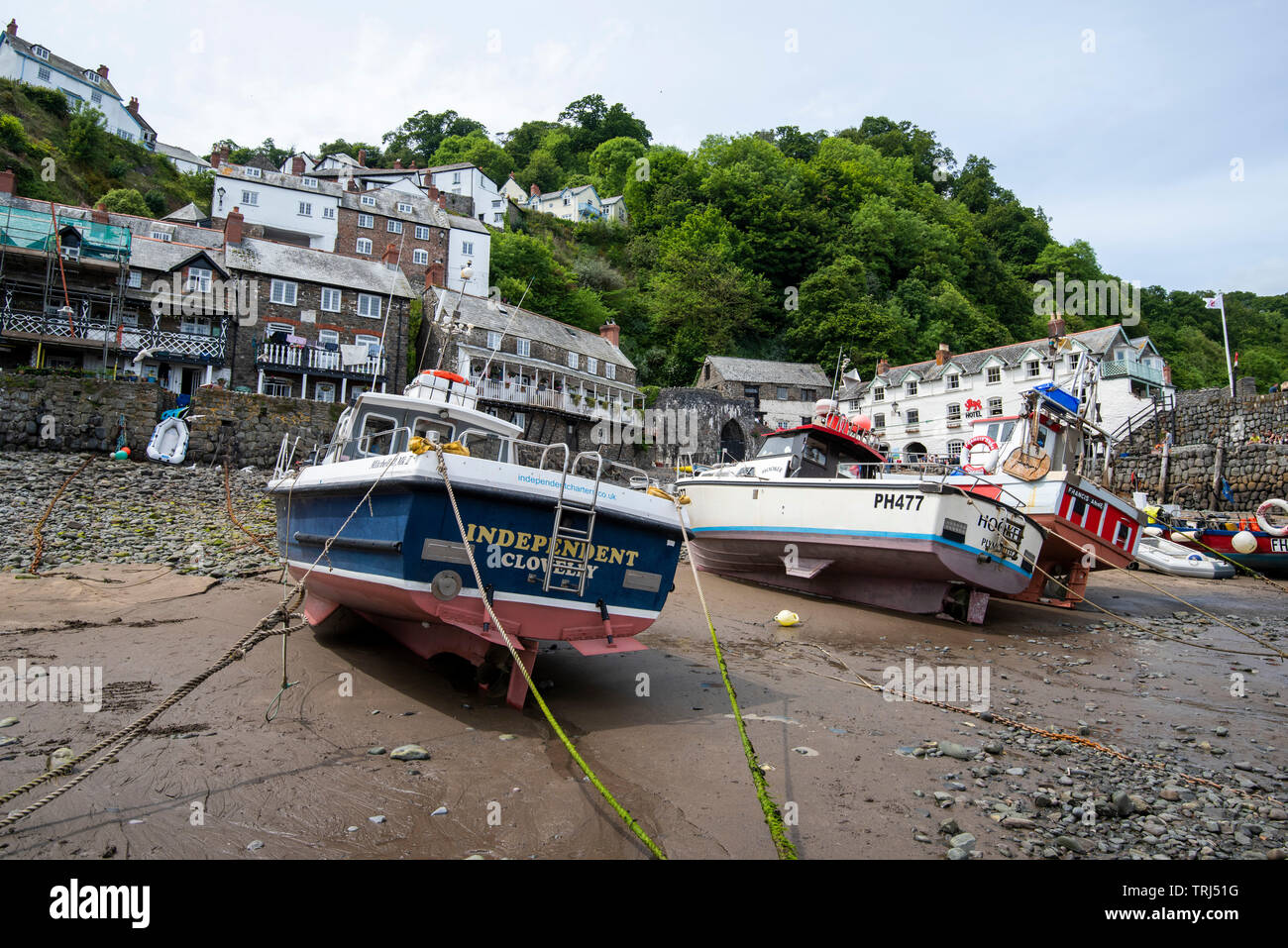 Fishing boats on the beach at Clovelly, Devon England UK Stock Photo