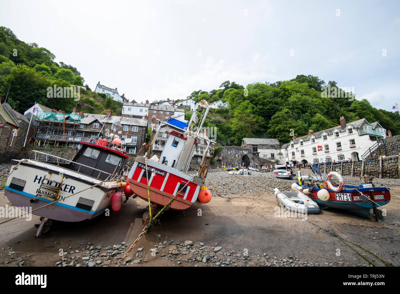 Fishing boats on the beach at Clovelly, Devon England UK Stock Photo