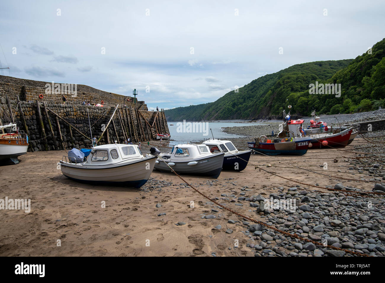 Boats on the Beach at Clovelly, Devon England UK Stock Photo