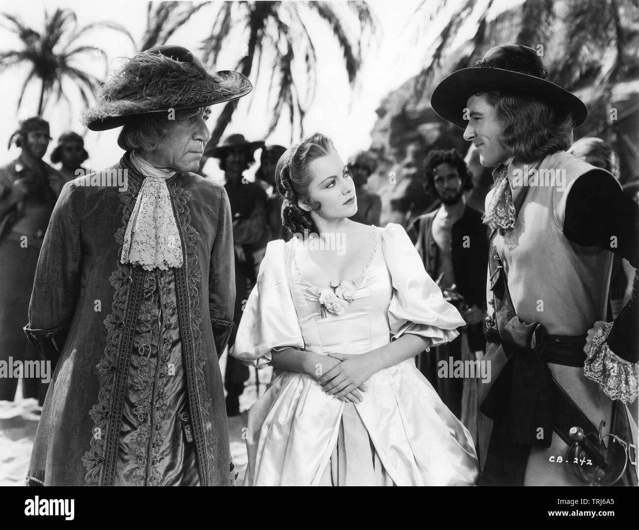 HENRY STEPHENSON OLIVIA de HAVILLAND and ERROL FLYNN in CAPTAIN BLOOD 1935  director Michael Curtiz novel Rafael Sabatini costumes Milo Anderson music  Erich Wolfgang Korngold Cosmopolitan Productions / Warner Bros Stock Photo  - Alamy