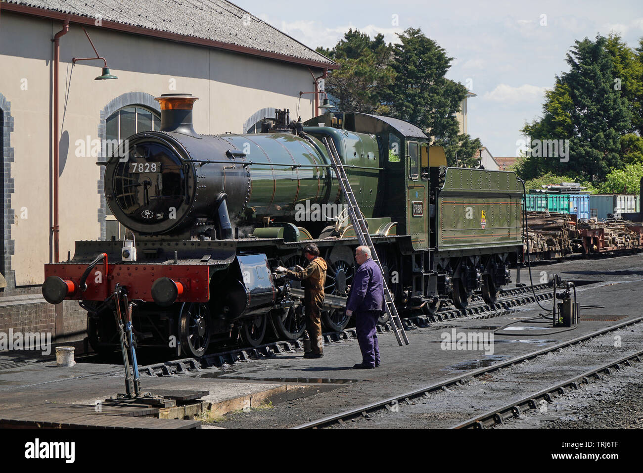 Volunteers working on the Odney Manor vintage steam locomotive at West Somerset Railway Stock Photo