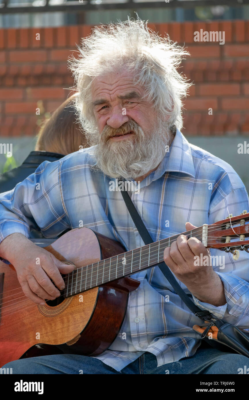 Old man playing guitar Stock Photo - Alamy