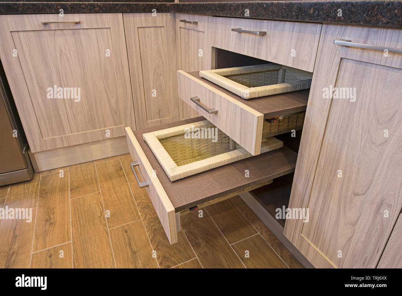 dinner leftovers (buckwheat kasha, vegetables, stir fry) in glass containers  with drawer cabinet in background Stock Photo - Alamy