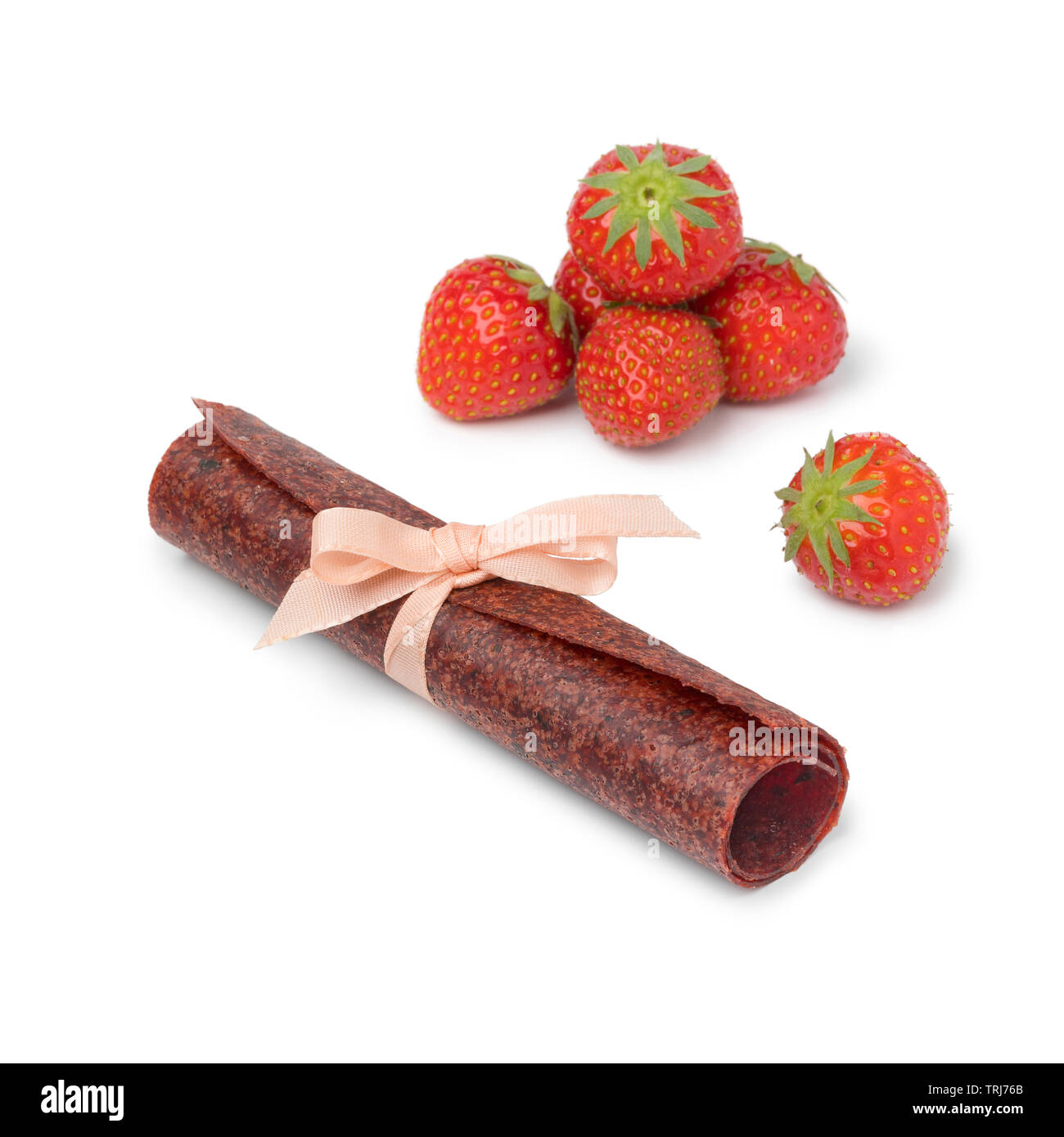 Roll of homemade strawberry fruit leather as a naturally sweet snack