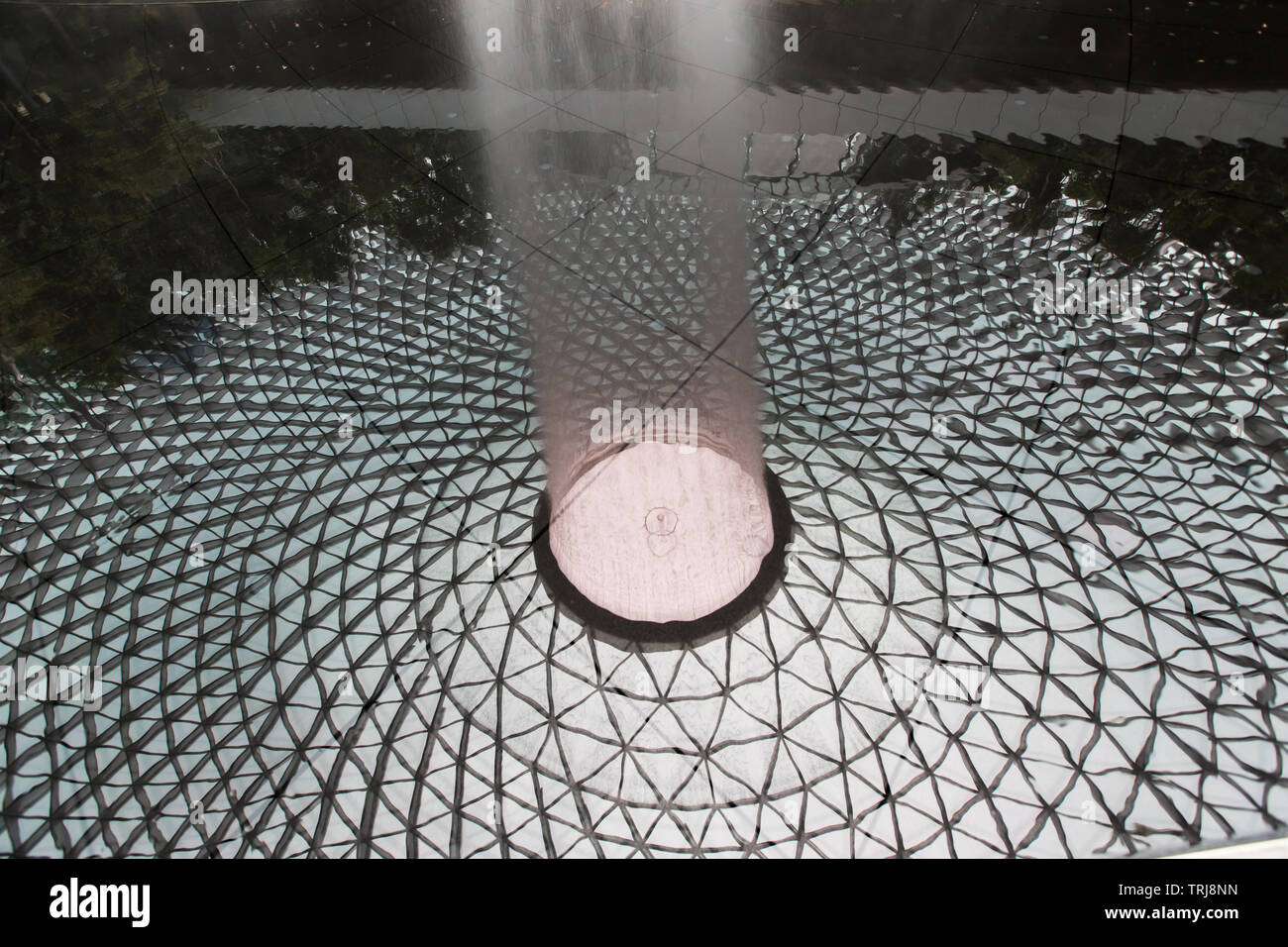 Inverted image of Rain Vortex or waterfall scene in Jewel Changi ...