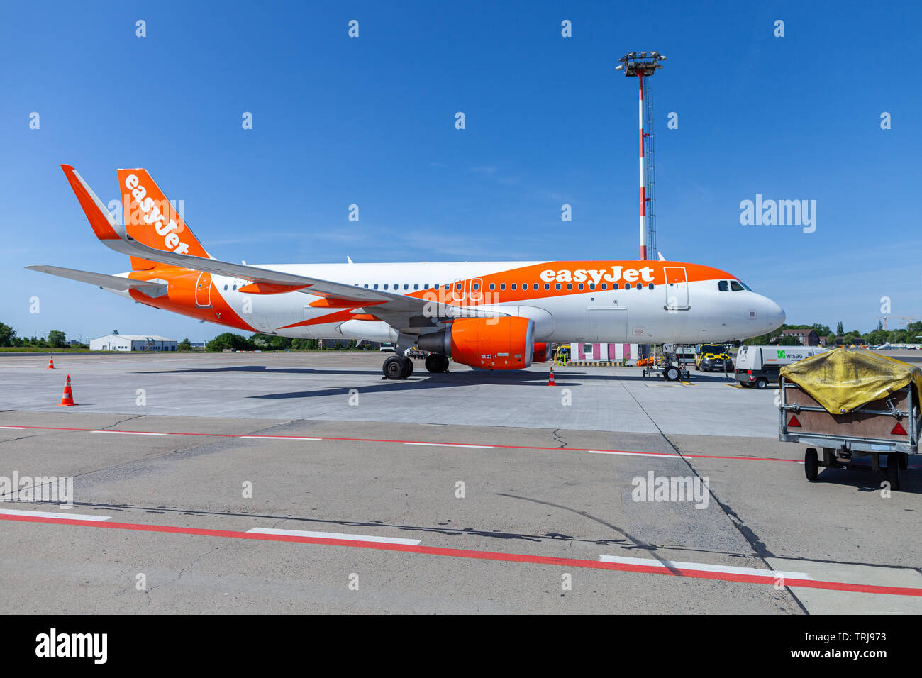 BERLIN SCHONEFELD / GERMANY - MAY 30, 2019: Airbus A320-200 from the easyjet airline stands at airfield on Berlin Schonefeld Airport. Stock Photo