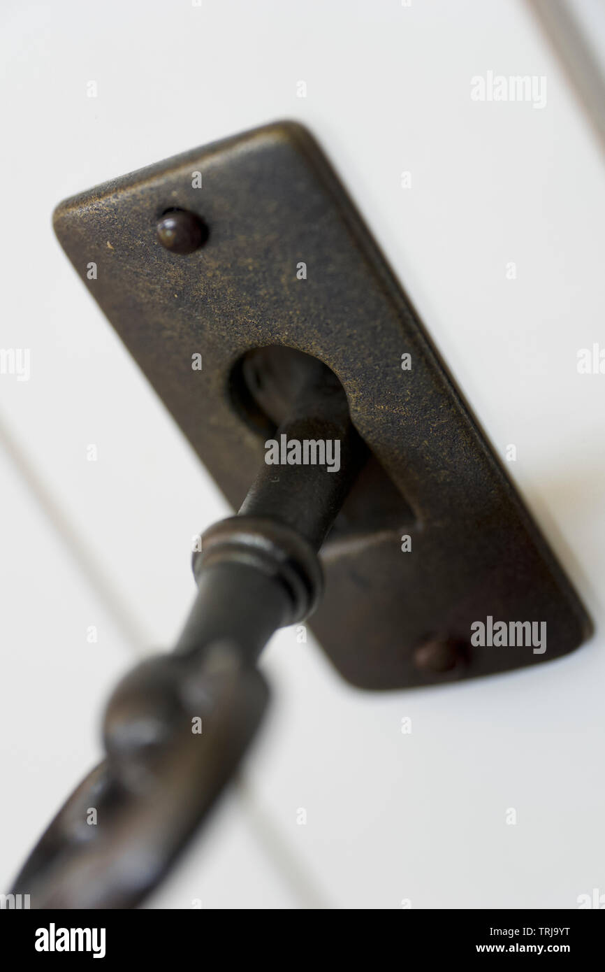 Key inside a keyhole Stock Photo