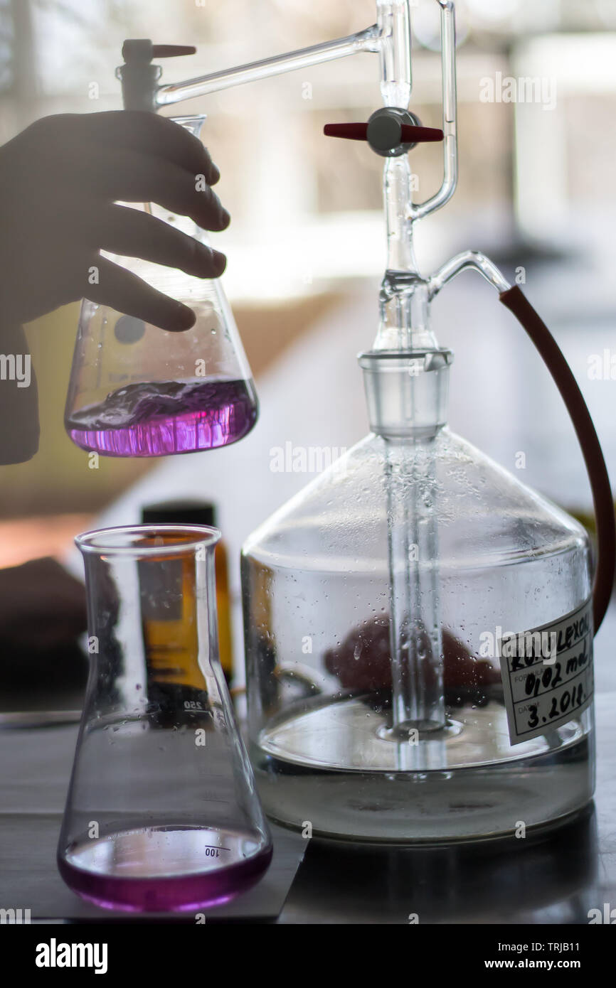 Working in a research chemistry biology lab laboratory making bioplastic bioplastics science Stock Photo