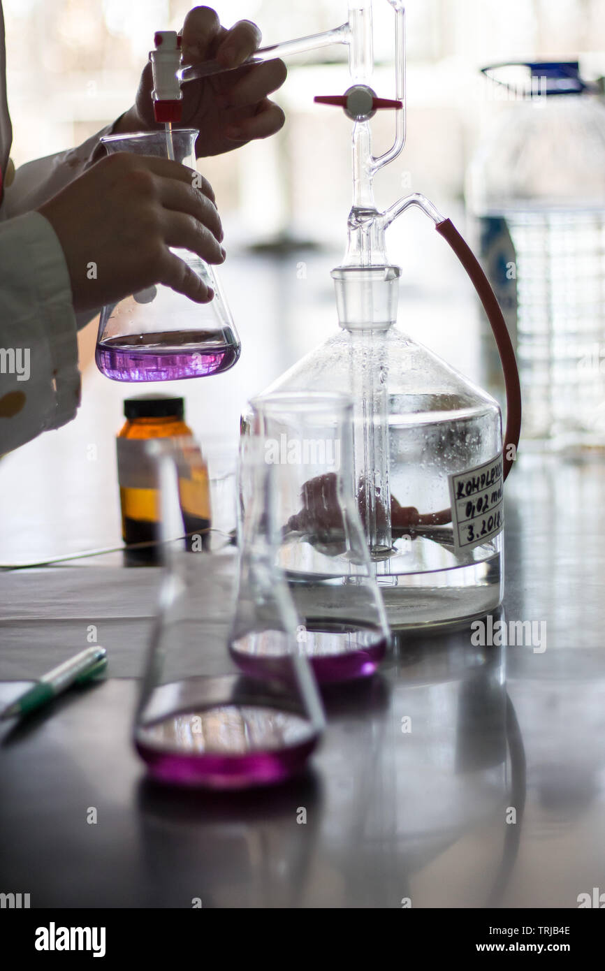 Working in a research chemistry biology lab laboratory making bioplastic bioplastics science Stock Photo