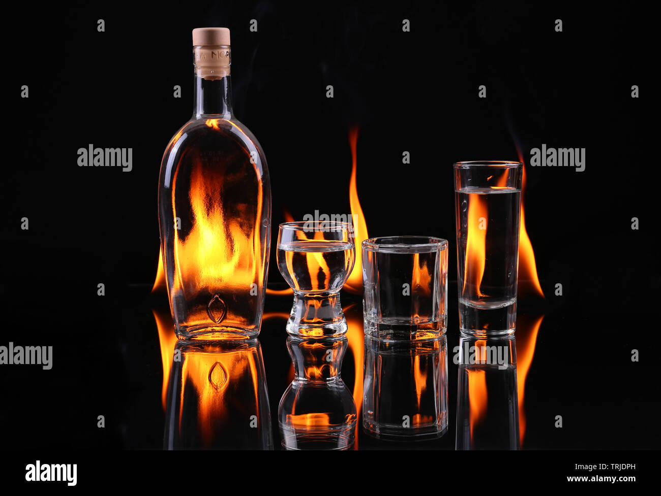 Stack of tequila on fire Stock Photo - Alamy
