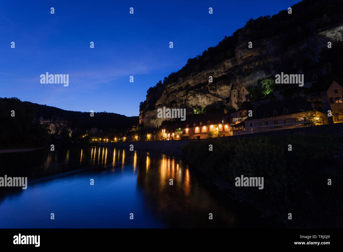 La Roque Gagac Dordogne River France night photograph lights reflections Stock Photo