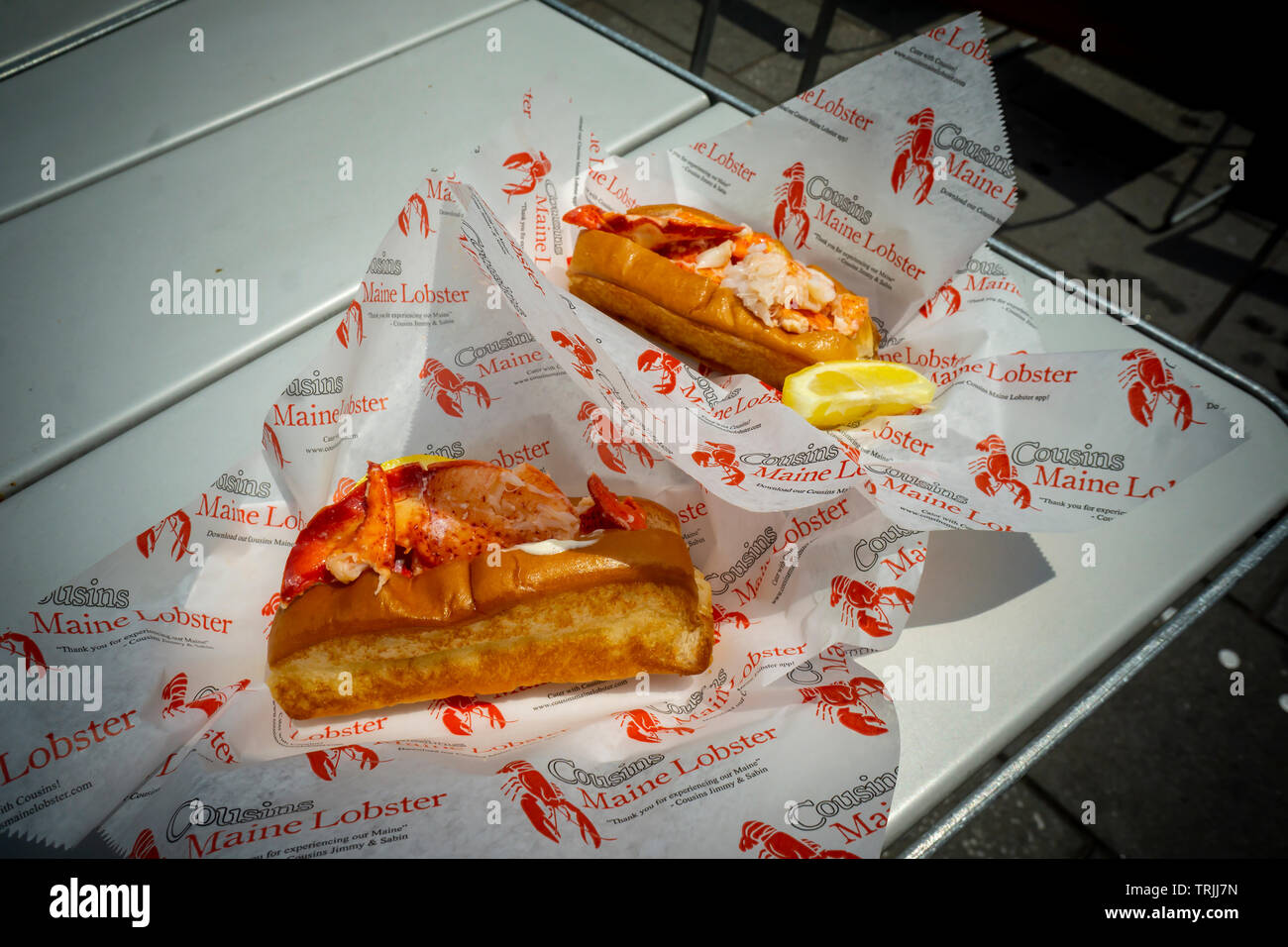 Lobster rolls from Cousins Maine Lobster kiosk in Times Square in New York on opening day, Wednesday, June 5, 2019. The restaurant chain achieved fame when Barbara Corcoran invested in them during an episode of the television show “Shark Tank”. (© Richard B. Levine) Stock Photo