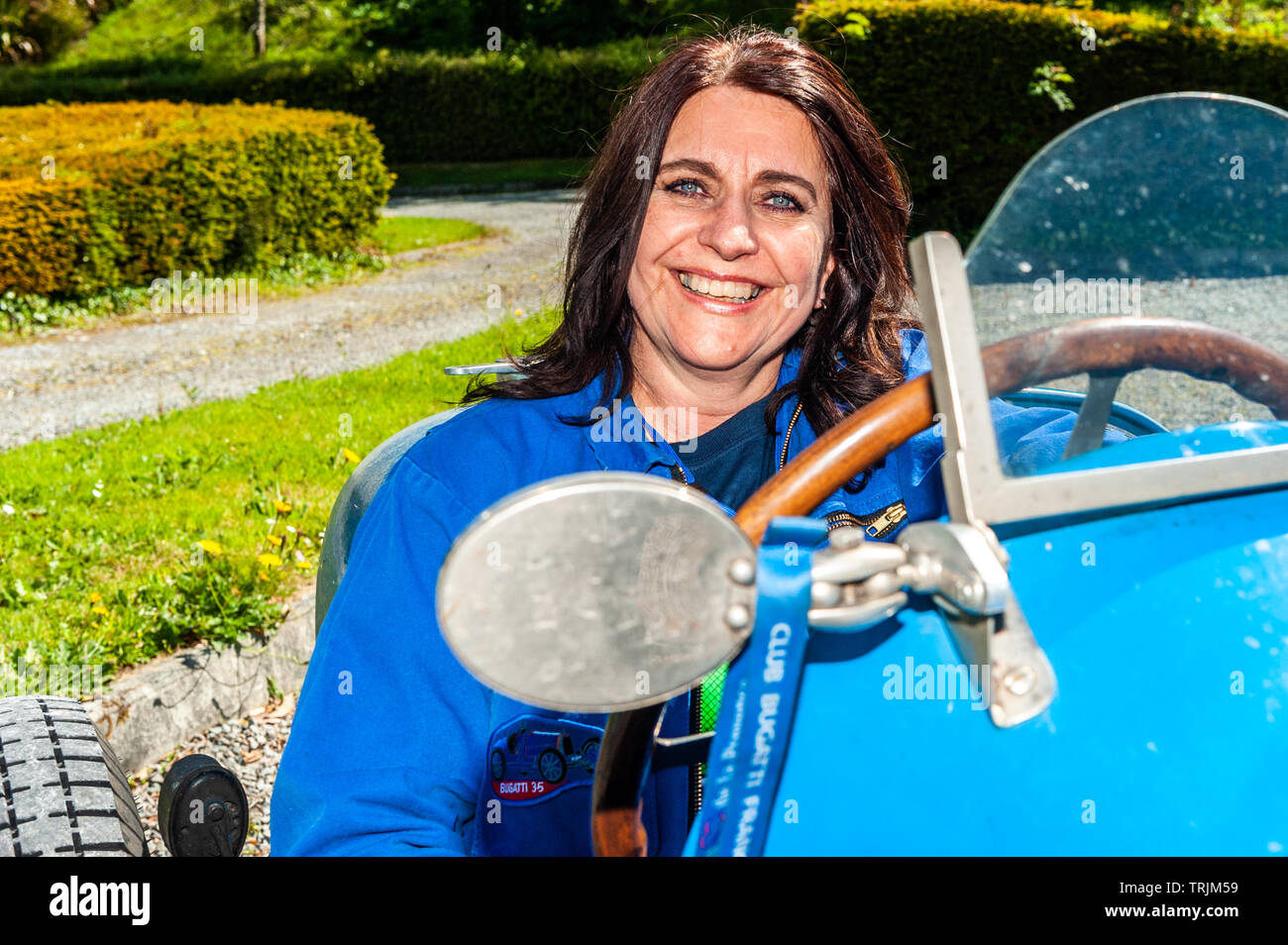 Bantry, West Cork, Ireland. 6th Juine, 2019. The Bugatti Owners Club is in Ireland this week for its annual international rally, featuring 100 vintage Bugatti's. After lunch in the West Lodge Hotel, the cars headed for the Mizen Head. At Bantry House & Gardens was Monica Berkhuyser from Belgium in her Bugatti. Credit: Andy Gibson/Alamy Live News.. Stock Photo
