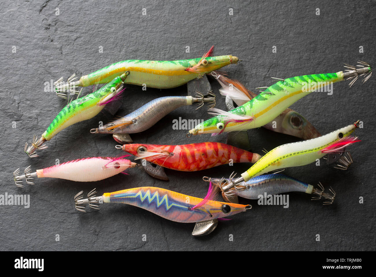A selection of squid jigs, or lures. Squid fishing has become popular in the UK both for commercial fishermen as well as recreational anglers. The lur Stock Photo