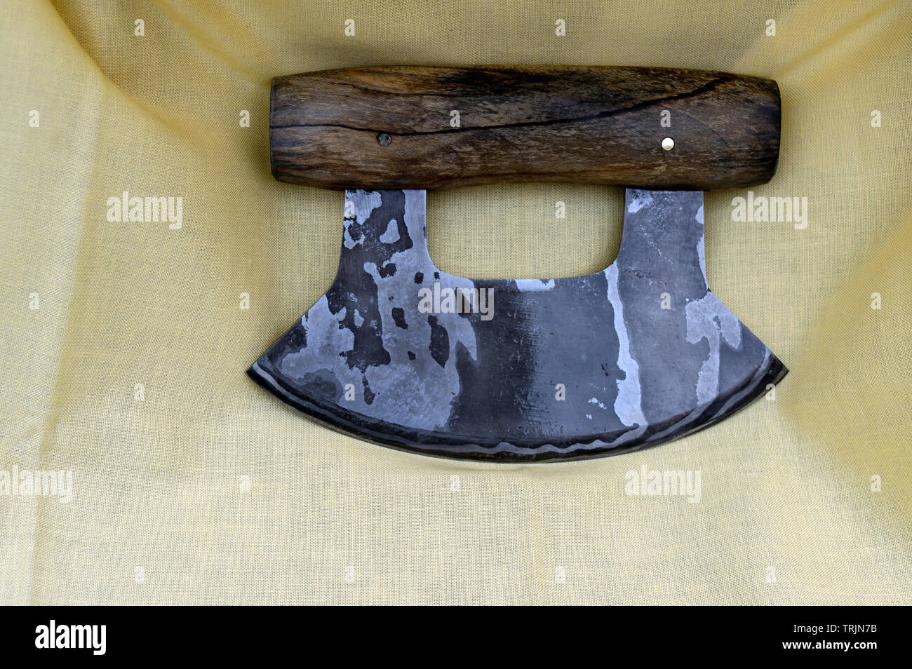 The ulu knife has an Alaskan history. This Damascus one was crafted by