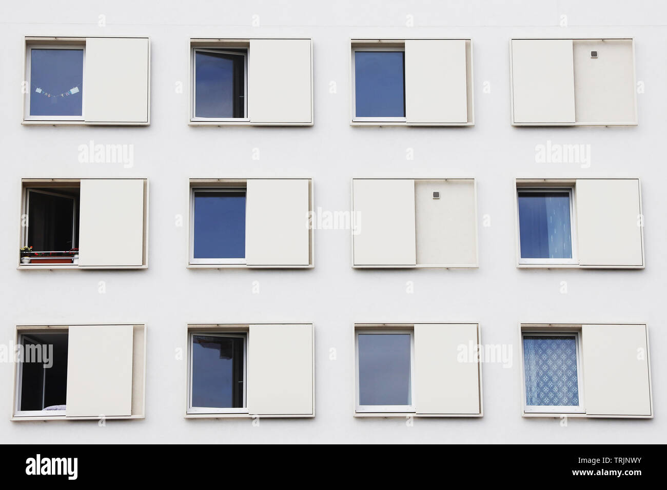12 windows on a residential building in Vienna Stock Photo