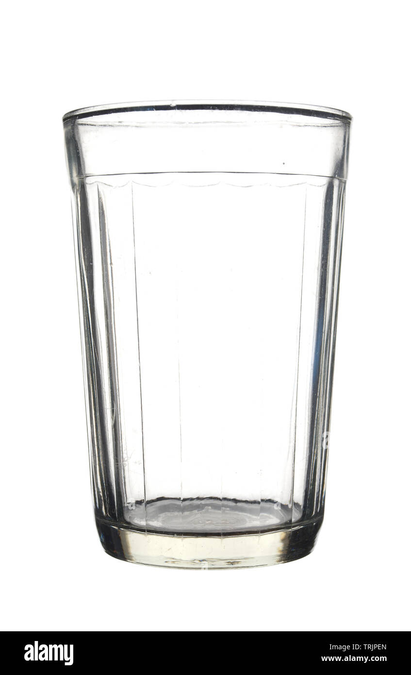 Empty faceted glass isolated on white background. Stock Photo