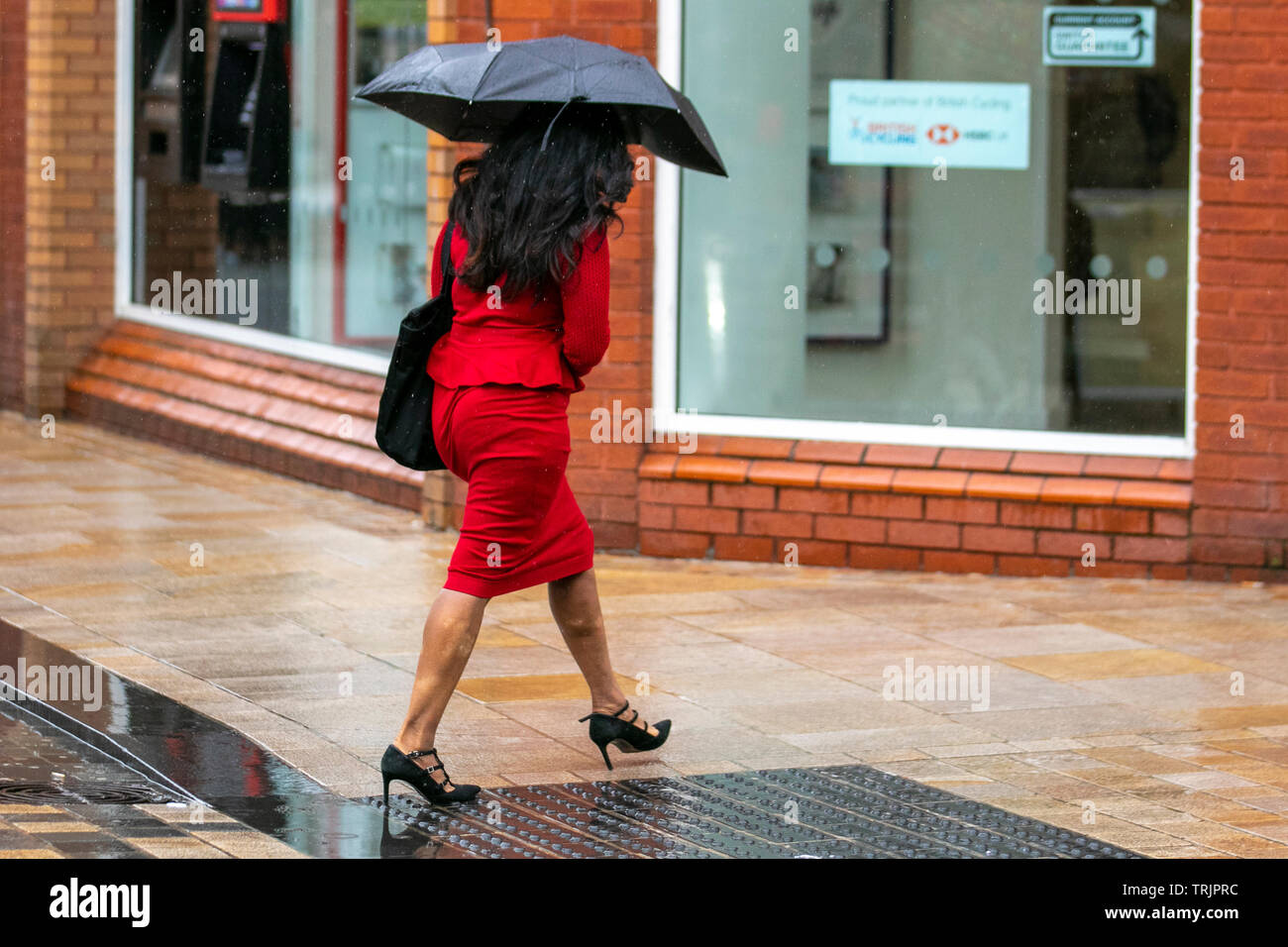 Preston, Lancashire. 7th June, 2019. UK Weather:  Heavy showers on Preston city centre as shoppers take cover as further adverse weather forecast for the weekend. Credit; MediaWorldImages/AlamyLiveNews. Stock Photo