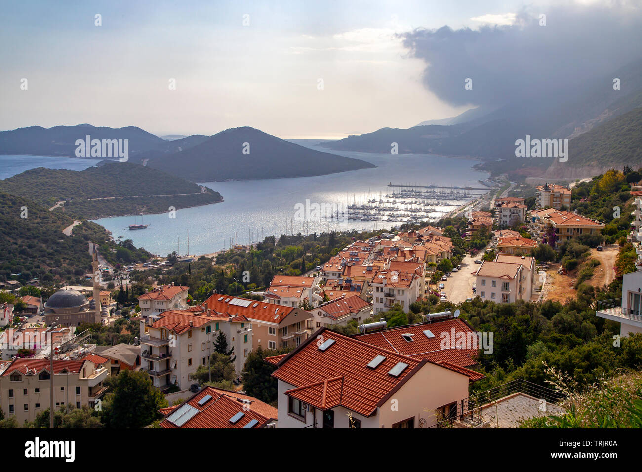 Kas city and marina view in a cloudy day. Kas is a very famous touristic town in Antalya, Turkey Stock Photo