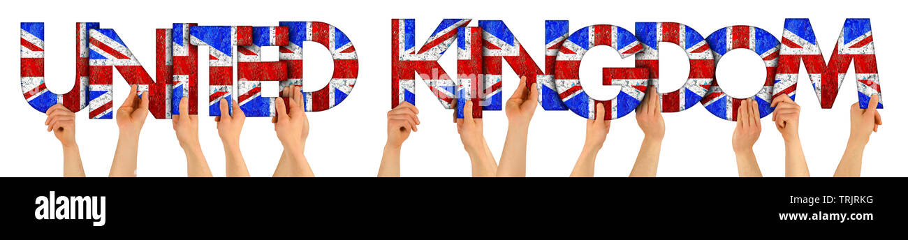 people arms hands holding up wooden letter lettering forming words united kingdom in union jack uk national flag colors tourism travel elections conce Stock Photo