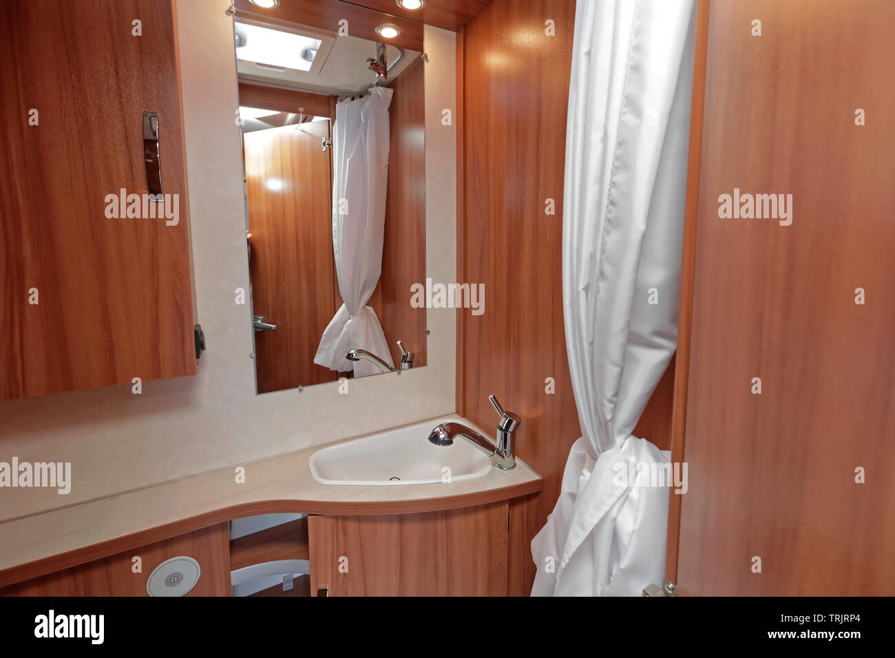 Camper Van Wooden Bathroom With Shower Curtain Stock Photo - Alamy