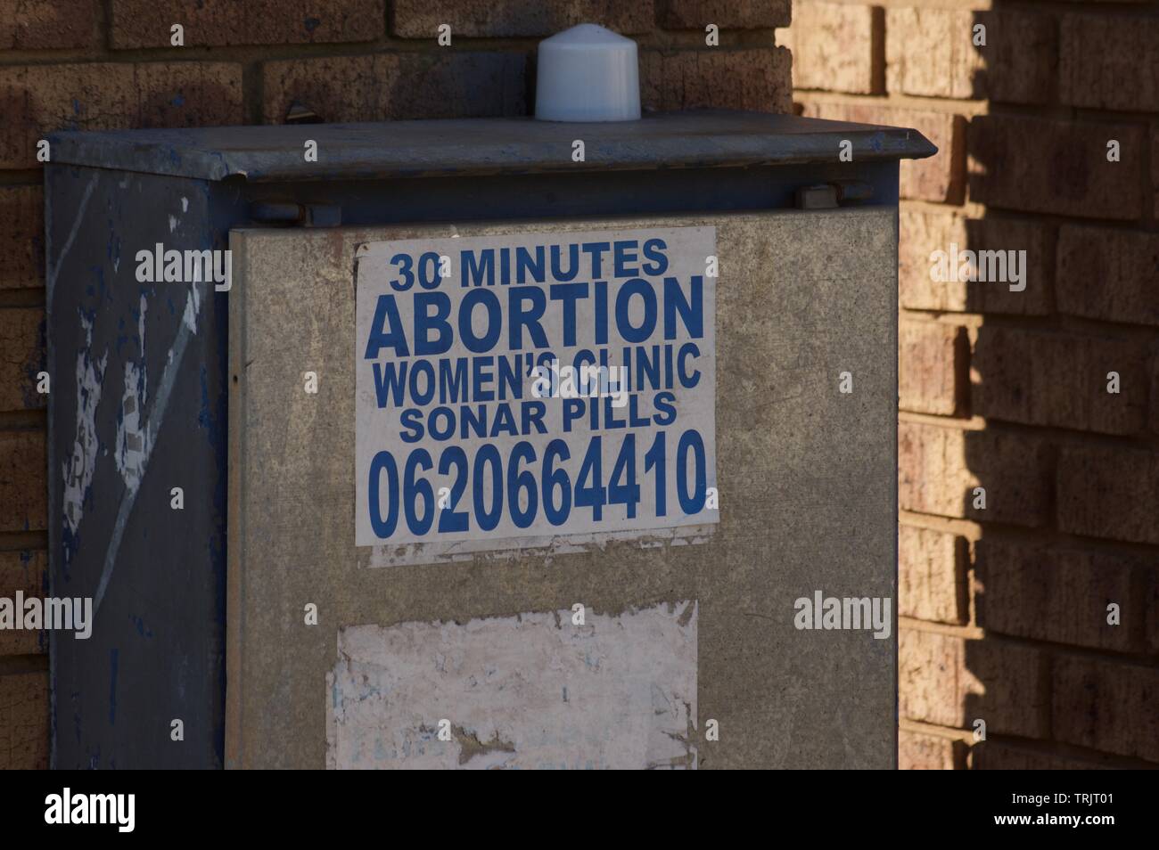 Quick abortion services advert in Johannesburg Stock Photo