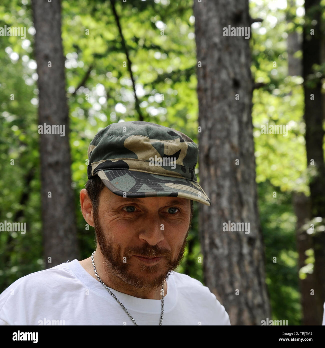 Bearded man in army cap hi-res stock photography and images - Alamy
