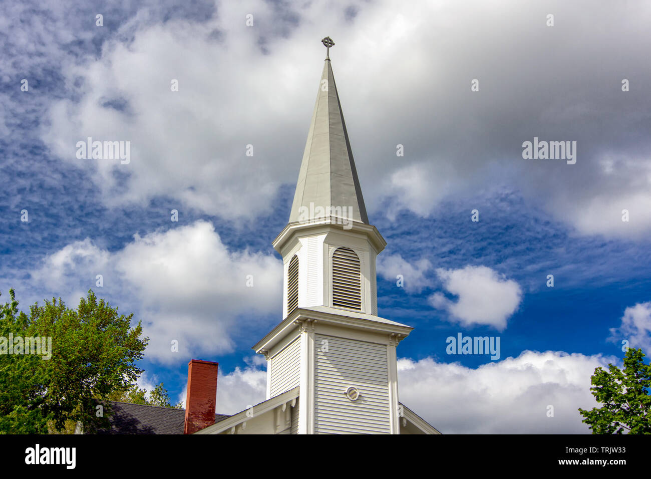Traditional white church steeple and tower in the American midwest. Stock Photo
