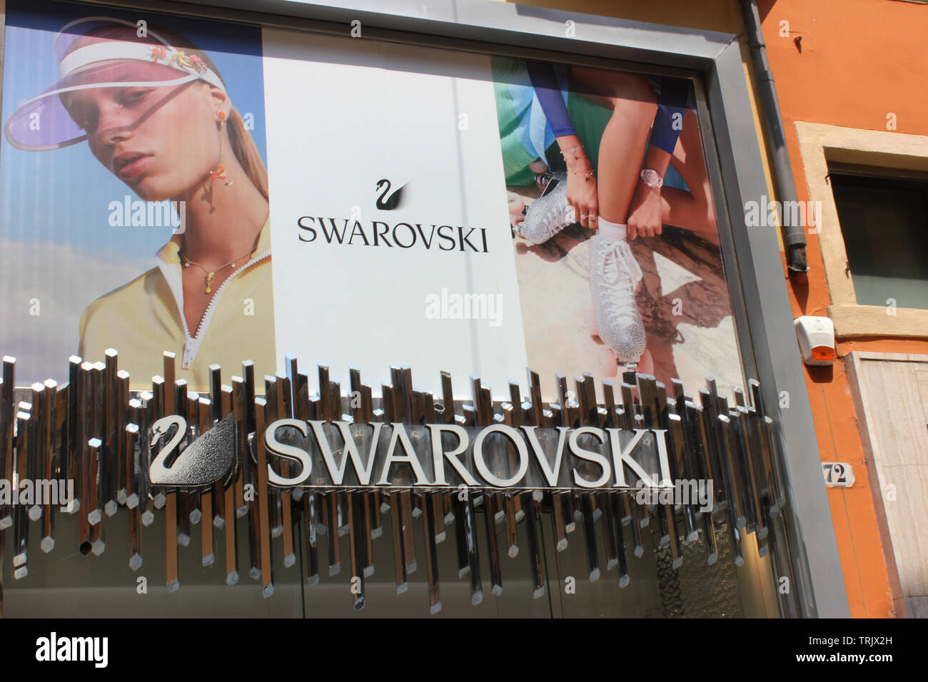 Swarovsky jewelry, store front, Verona. Larger than life-sized advertisement. Stock Photo