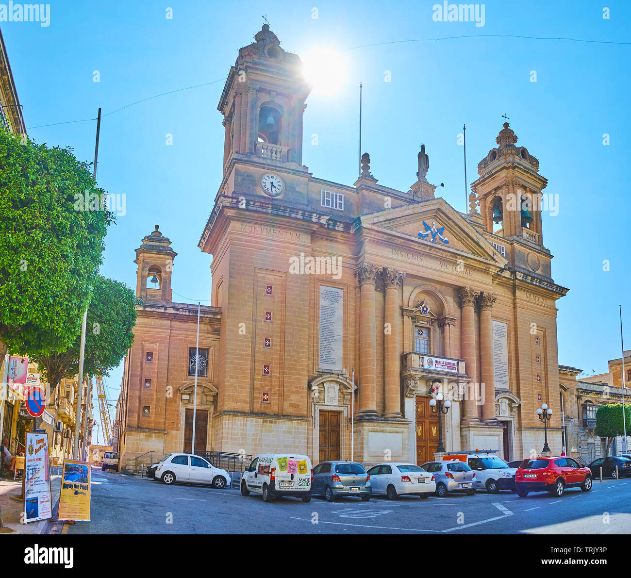 SENGLEA, MALTA - JUNE 19, 2018: The facade of the Parish  Church of Nativity of Virgin Mary (Maria Bambina), decorated with columns, carvings and scul Stock Photo
