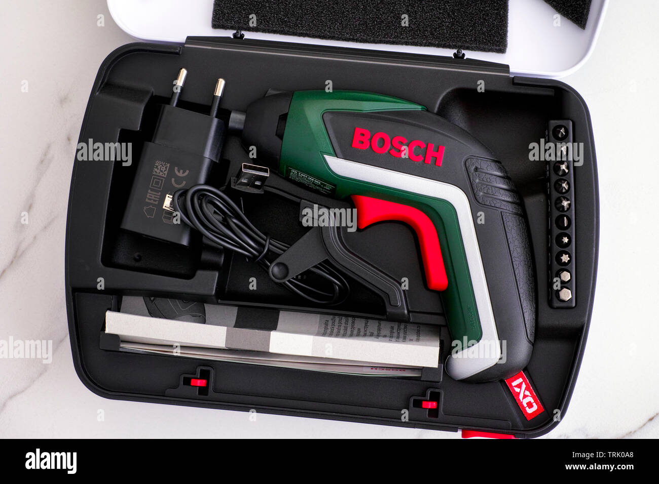 Tambov, Russian Federation - February 09, 2019 Bosch Cordless Screwdriver  in open case with bit set, instruction and charger Stock Photo - Alamy