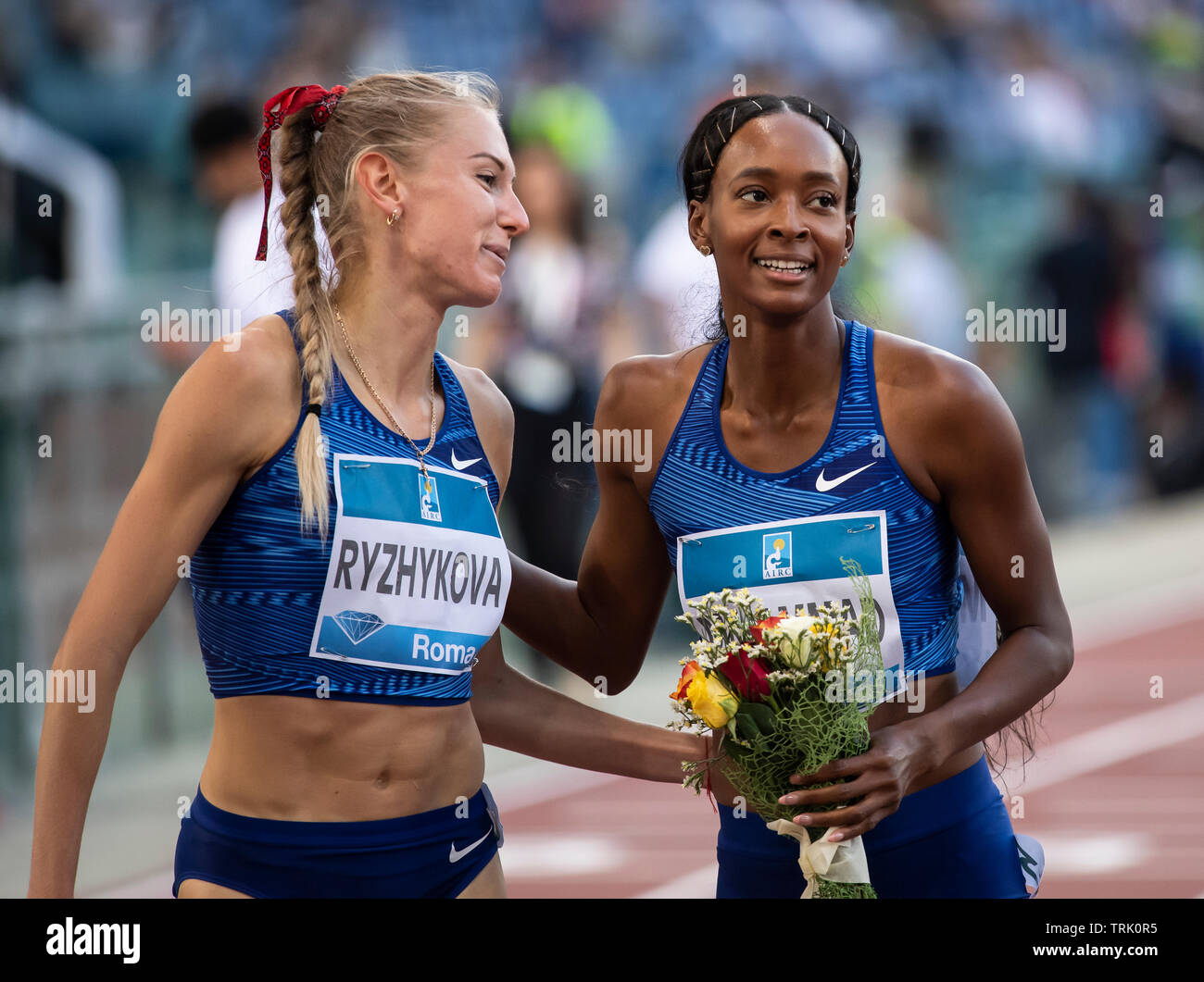 ROME - ITALY 6 JUNE 2019: Anna Ryzhykova (UKR) congratulating Dalilah Muhammad (USA) for winning the women’s 400m hurdles at the Golden Gala IAAF Diam Stock Photo
