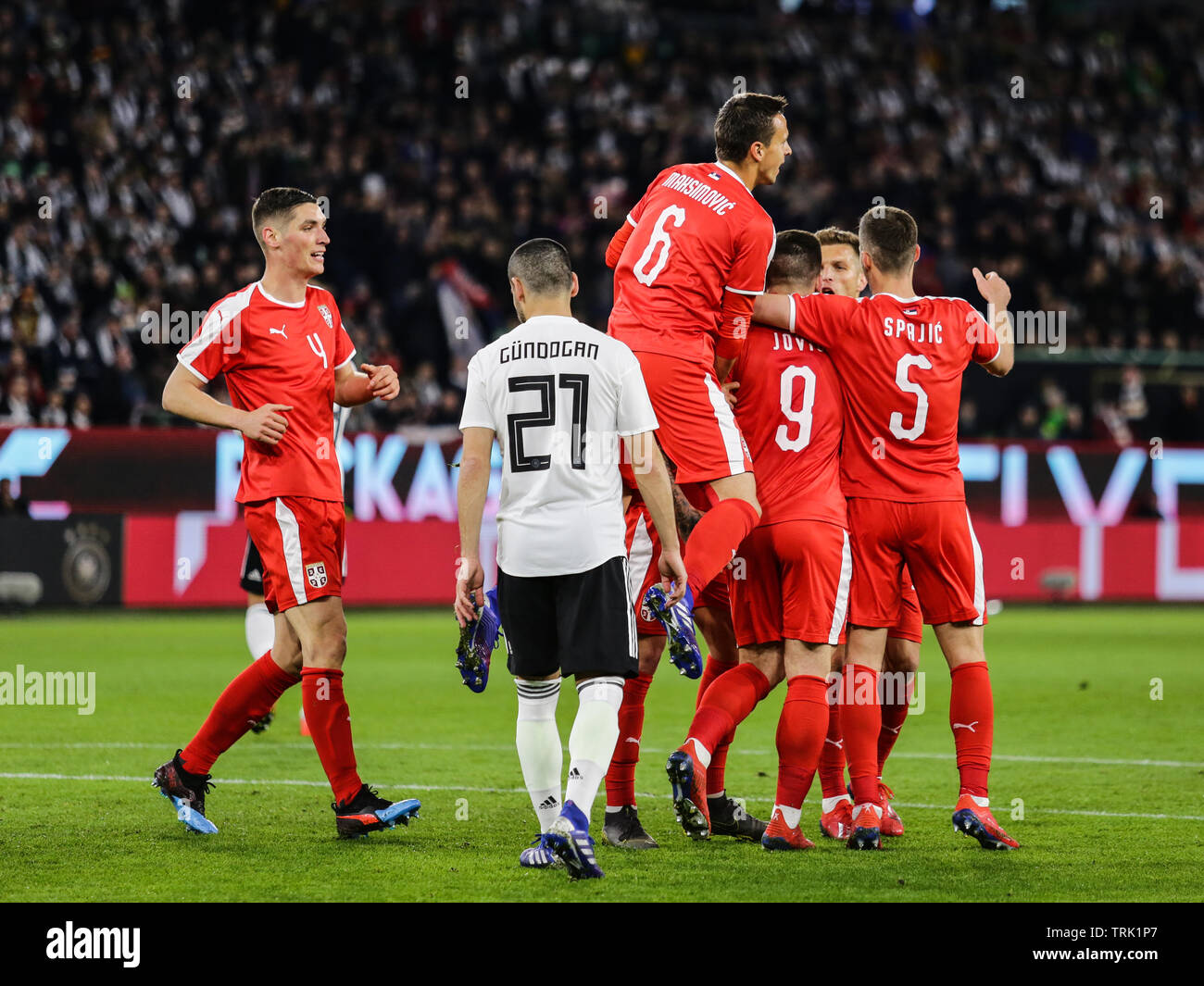 Wolfsburg, Germany, March 20, 2019: Serbian soccer players celebrating their first goal during the soccer game Germany vs Serbia. Stock Photo