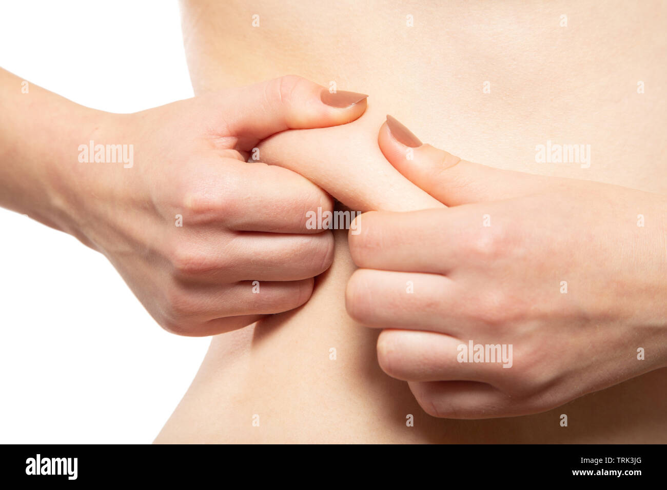 punch oversized female buttocks with cellulite on white background Stock Photo