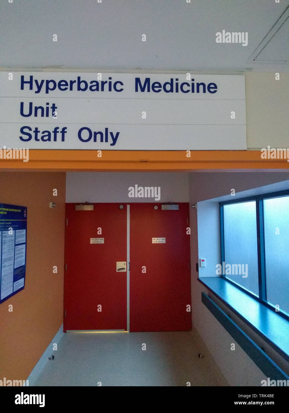 hyperbaric medicine unit sign , staff entrance in a Australian hospital Stock Photo