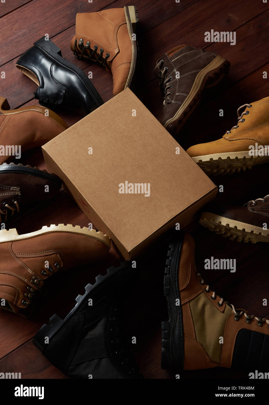Cartoon box around leather shoes above top view Stock Photo