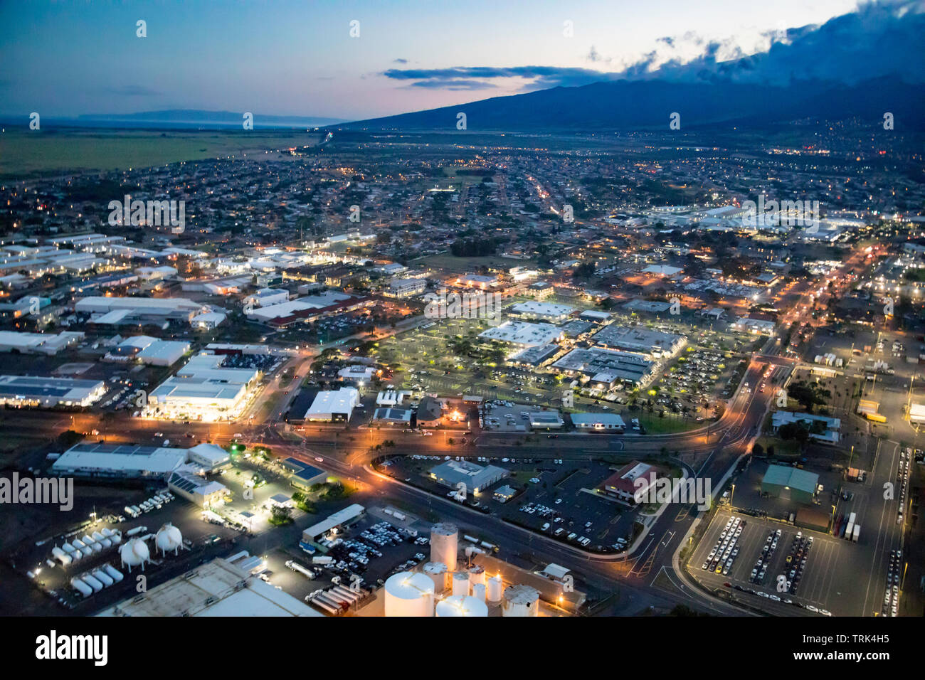 The town of Kahului, Maui, Hawaii, with the Maui Mall in the foreground. Stock Photo